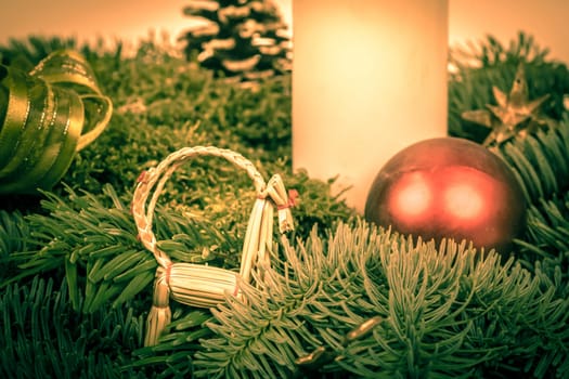 Beautiful christmas decoration with pine twigs and a candle