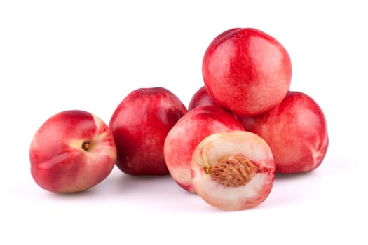 Nectarine peaches isolated on white background.