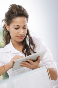 Handsome businesswoman  using his digital tablet