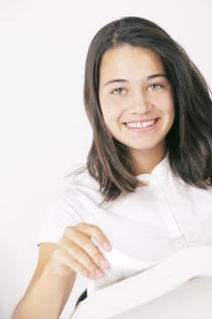 Smiling girl turn the page