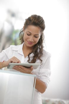 Handsome businesswoman  using his digital tablet