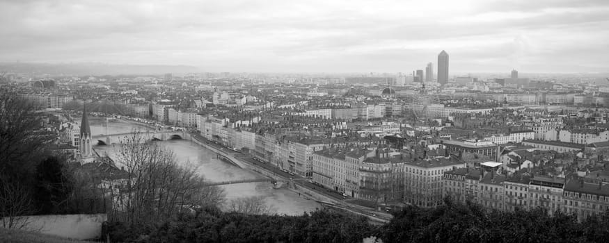 Details of a panoramic view of Lyon in black and white.