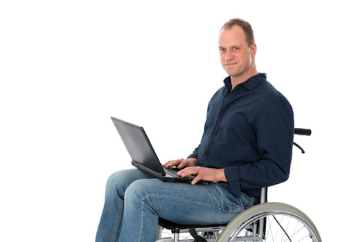 Wheelchair user works with computer