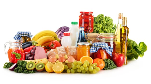 Composition with variety of grocery products isolated on white