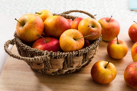 Basket of yellow and red apples