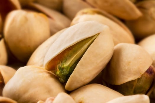 Close up of a pistachio nut in a group