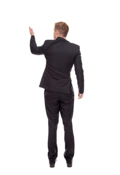 Back view of a business man pointing hand