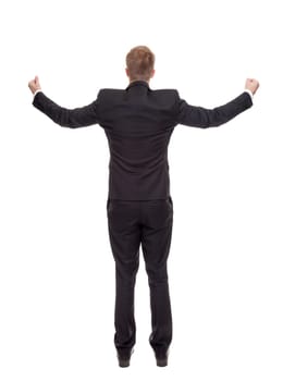 Businessman celebrating with raised arms isolated on white