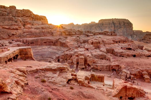High view point of Petra tombs and amphitheater at sunset