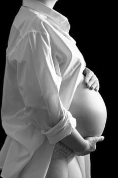 Belly of a nine month pregnant woman