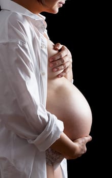 Belly of a nine month pregnant woman
