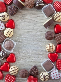 Various chocolates and chocolates on a gray background