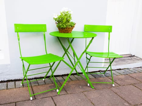 Bright green Cafe Table and Chairs at Reykjavik Iceland