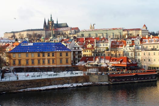 The Castle of Prague togheter with the snow and the sun