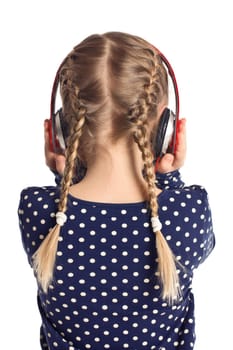 little girl with headphones from behind on white background