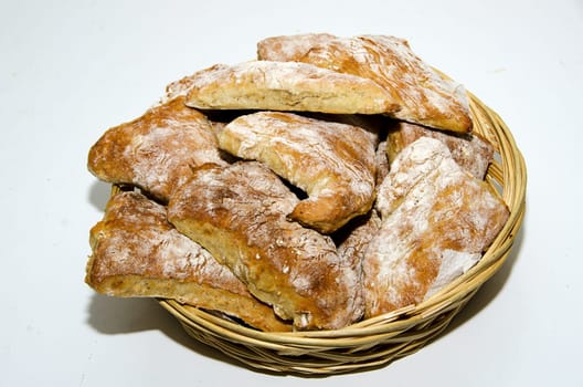 freshly made hot breakfast rolls in the bread basket for breakfast
