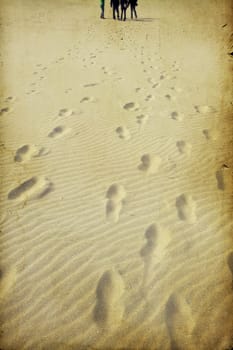 Footprints on the beach sand