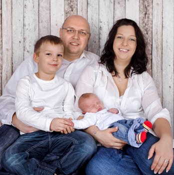 happy family with newborn