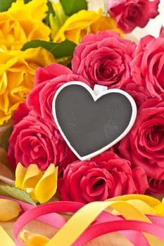 Yellow and pink roses and a small panel with text space