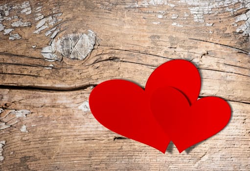 Valentines Vintage Handmade Couple Hearts over Wooden Background.