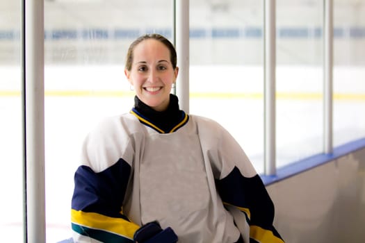 Female ice hockey player playing in a game