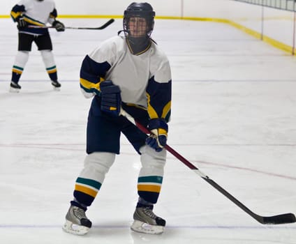 Female ice hockey player playing in a game