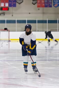 Female ice hockey player playing in a game