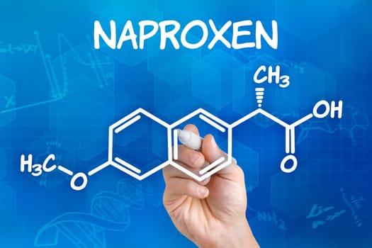 Hand Draws Chemical Structural Formula of Naproxen