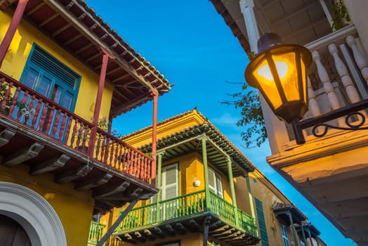 Street corner in Cartagena, Colombia where three old colonial balconies converge