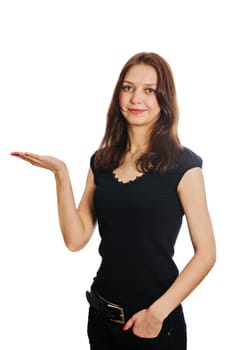 Portrait of pretty young woman holding her hands out and presenting your product