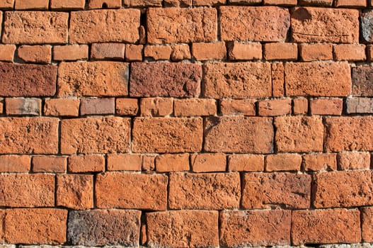 Brick wall of old rural house as background
