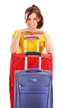 Young woman with travel suitcases. Tourist ready for a trip