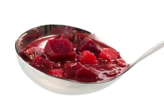 Ladle full of borscht soup on white background
