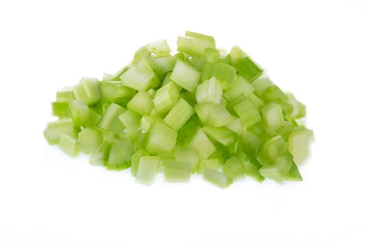 Chopped raw celery isolated on white background.