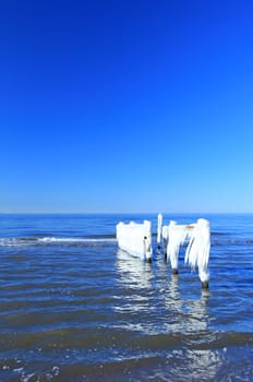 Icicle on a wooden fence on the Baltic Sea,Western Pomerania Lagoon Landscape National Park,Darss,near Prerow,Mecklenburg-Western Pomerania,Germany