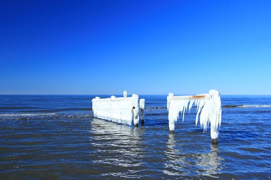 Icicle on a wooden fence on the Baltic Sea,Western Pomerania Lagoon Landscape National Park,Darss,near Prerow,Mecklenburg-Western Pomerania,Germany