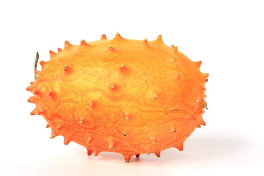 Horned cucumber (Cucumis metuliferus),exposed against a white background