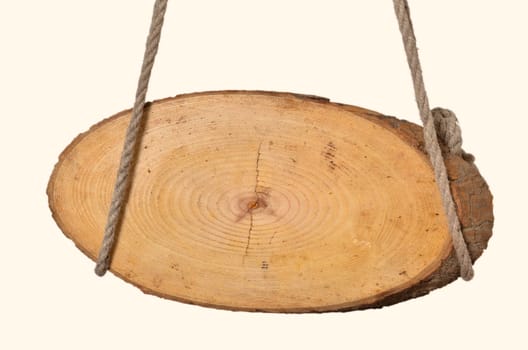 old wooden sign hangs knitting rope