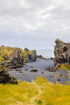 Icelandic beach with black lava rocks, Snaefellsnes peninsula, Iceland