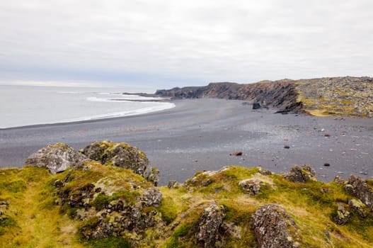 Icelandic beach with black lava rocks, Snaefellsnes peninsula, Iceland