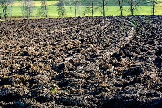 freshly plowed field in winter