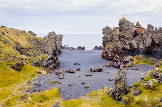 Icelandic beach with black lava rocks, Snaefellsnes peninsula, Iceland