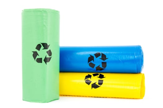 Plastic garbage bio bags in a rolls on white background