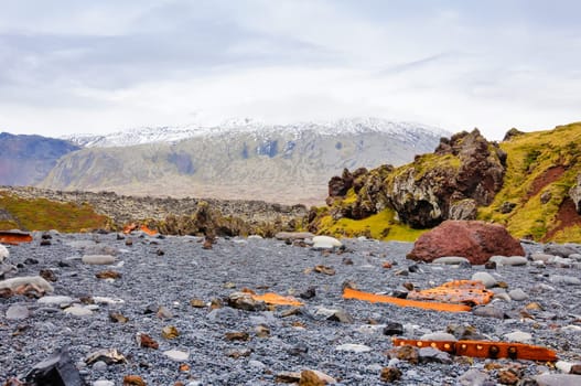 Remains of a boat wreck at the black beach on Iceland Snaefellsnes Dritvik