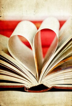 Vintage photo of heart shaped book pages