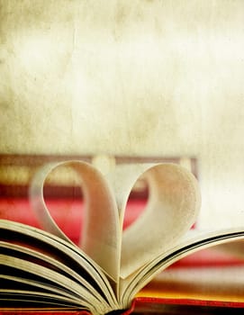 Vintage photo of heart shaped book pages