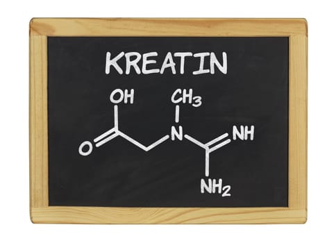chemical structural formula of creatine on a slate