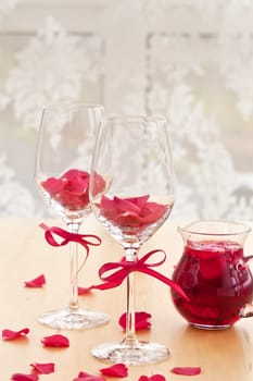 Two glasses of pink rose flowers