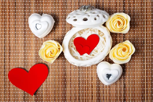 Still life of red hearts on a white casket. concept for valentines day