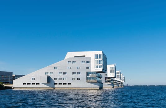 modern apartments at a lake shore in the netherlands